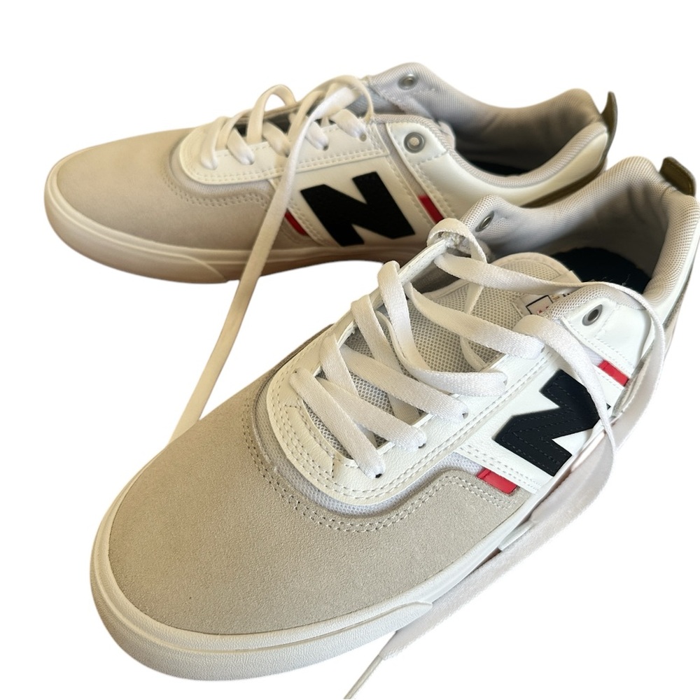 New Balance Beige and Black Sneakers